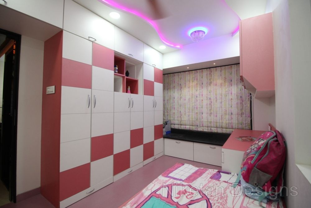Niketan's colour co-ordinated theme bedroom design with ceiling lights